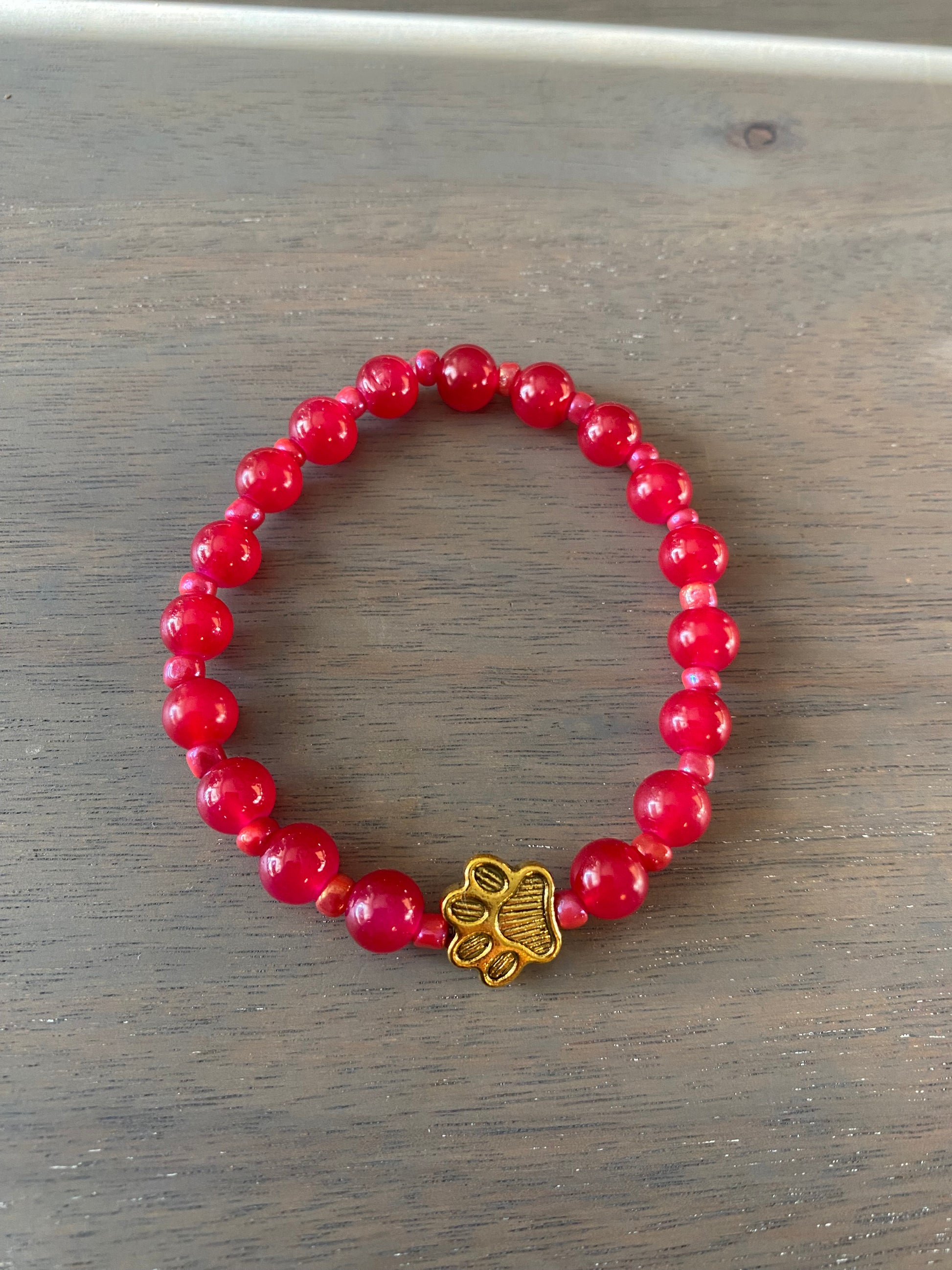 Stretch Cord Bead Bracelet with Gold Paw