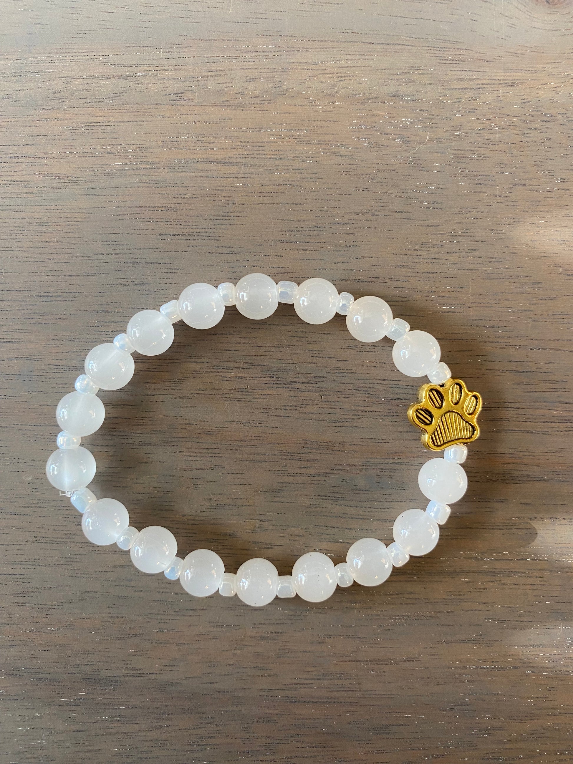 Stretch Cord Bead Bracelet with Gold Paw
