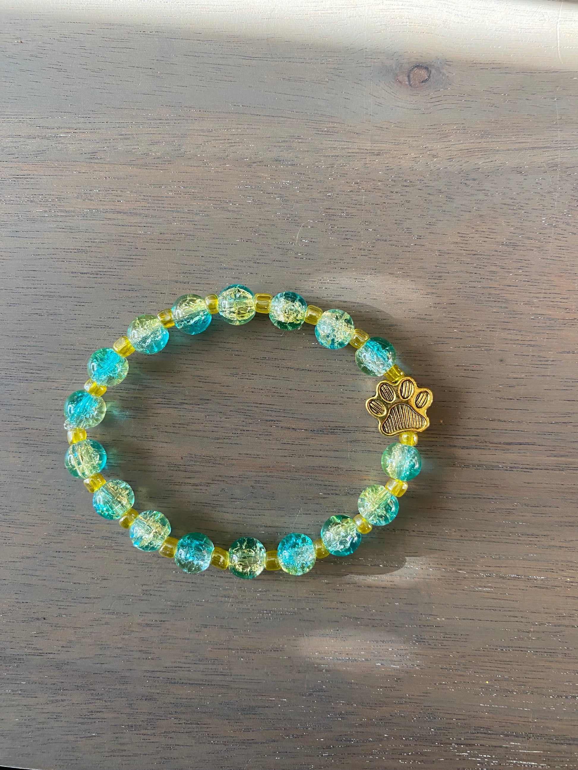 Stretch Cord Bead Bracelet with Gold Paw