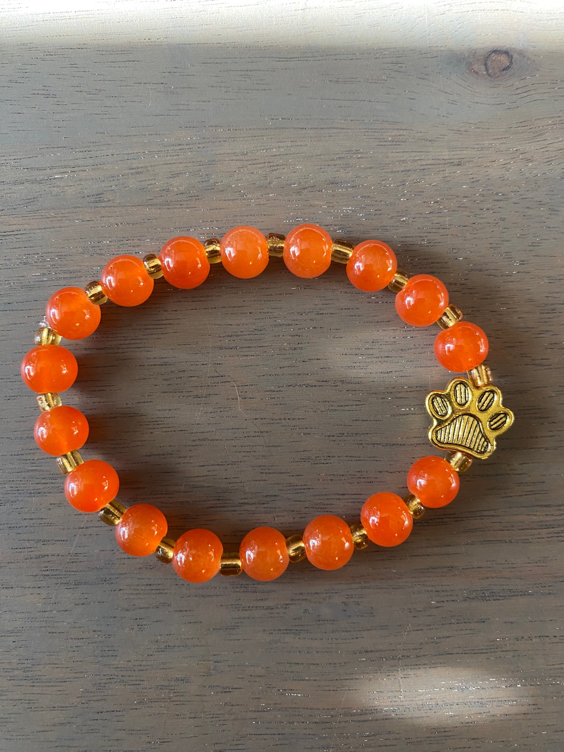 Stretch Cord Bead Bracelet with Gold Paw