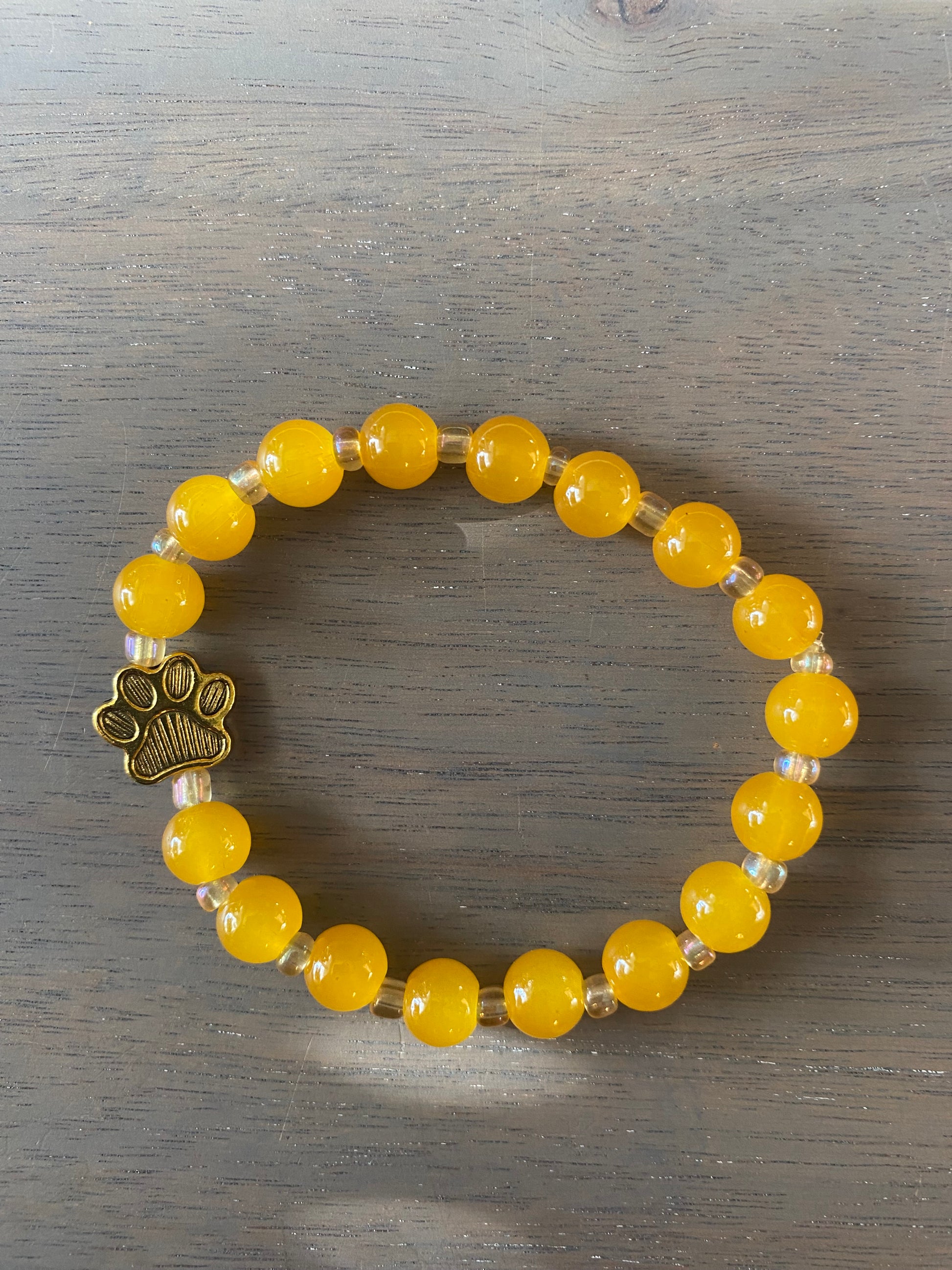 Stretch Cord Bead Bracelet with Gold Paw